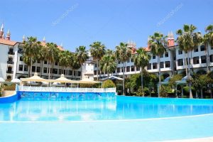 depositphotos_1776360-stock-photo-swimming-pool-at-popular-hotel.jpg